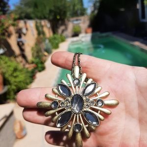 Stunning antiqued gold finish, long necklace.